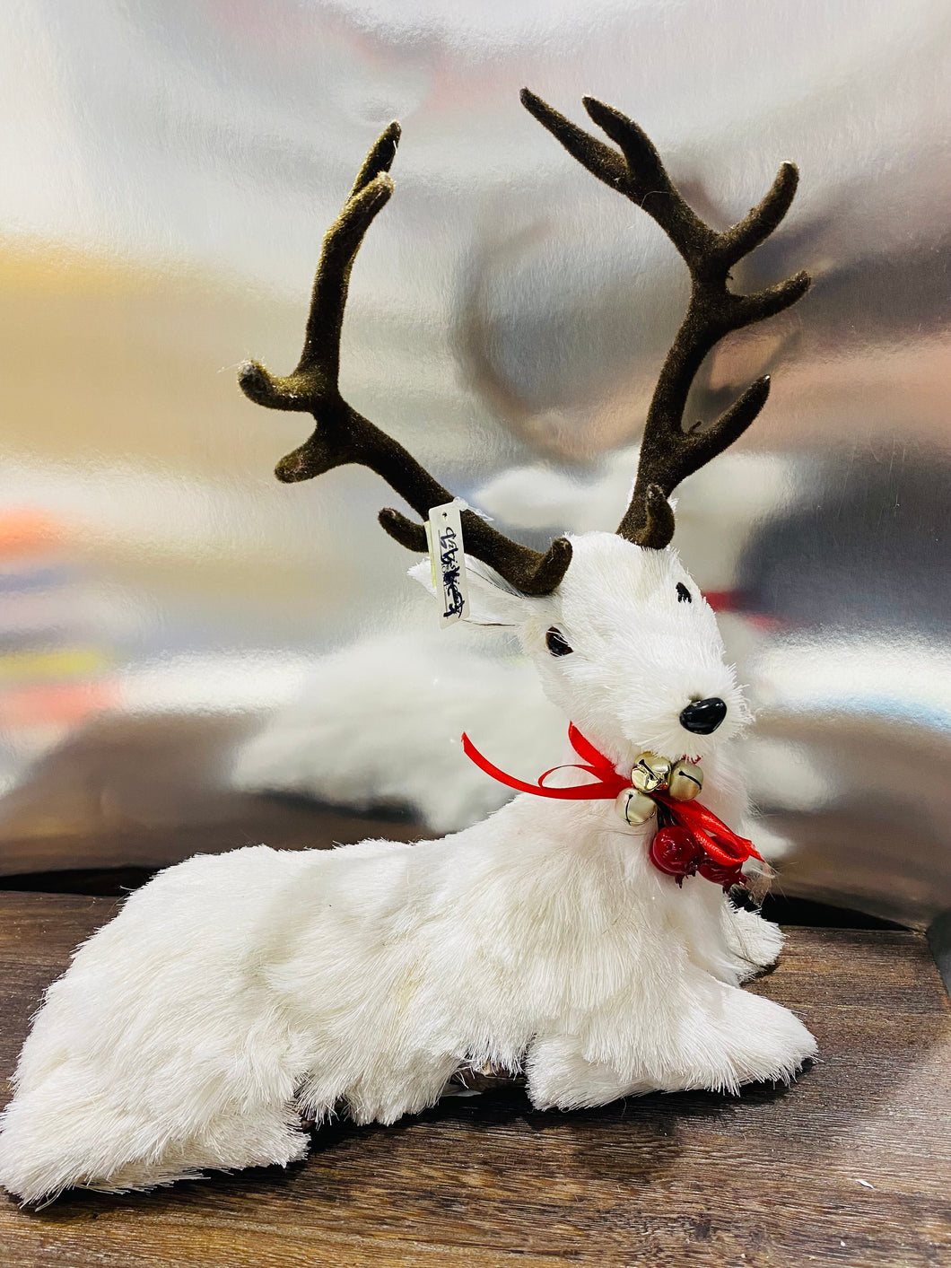 White lying down reindeer