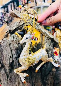 Golden reindeer resin made ornament