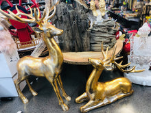 Load image into Gallery viewer, Golden resin reindeers ( selling as a pair)
