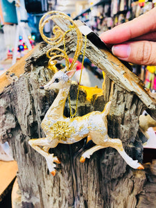 Golden reindeer resin made ornament