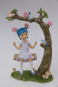 19CM FUNKY HAIR FLOWER GIRL ON SWING